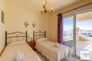 Posteľ alebo postele v izbe v ubytovaní Apartamento Apolo XVIII 57 - Grupo Turis
