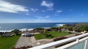 a view of the ocean from the balcony of a house at Apt. El Guirre Nº 14 in Valle Gran Rey