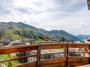 a view from the balcony of a building with mountains at Appartement Avoriaz, 3 pièces, 6 personnes - FR-1-314-160 in Avoriaz