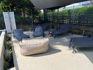 Un lugar para sentarse en Luxury 4 Apartaments Cervia with Swimming Pool