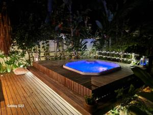 Majoituspaikassa Mini Casa com Jacuzzi e Piscina tai sen lähellä sijaitseva uima-allas