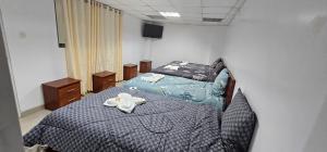 Ένα ή περισσότερα κρεβάτια σε δωμάτιο στο HOTEL TICLIO