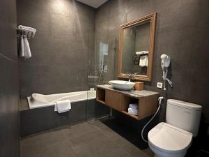Kopalnica v nastanitvi Tabebuya Resto & Resort