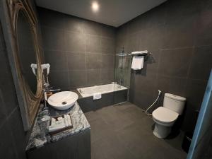 Kopalnica v nastanitvi Tabebuya Resto & Resort