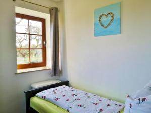 Postel nebo postele na pokoji v ubytování Hof am Meer "Seeperle"