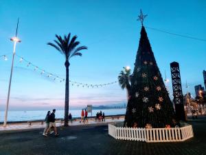 a christmas tree in the middle of a beach at Blue Sky apartment in Benidorm