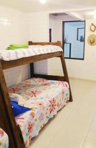 Postel nebo postele na pokoji v ubytování Orquidia 12
