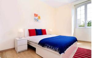 En eller flere senge i et værelse på Lightoasis Oeiras 6 + 10 billeder