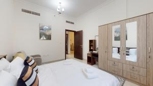 Fotografie z fotogalerie ubytování Primestay - G24 Tower 1BR plus Maids in JVC v Dubaji + 13 fotografií