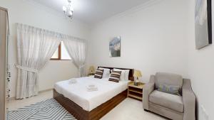 Fotografie z fotogalerie ubytování Primestay - G24 Tower 1BR plus Maids in JVC v Dubaji