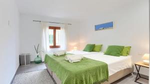 Postel nebo postele na pokoji v ubytování Casa Hill