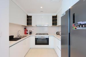 Fotografie z fotogalerie ubytování Livbnb Suites - Elegant 3BR+Maids Room w/ Burj Khalifa View v Dubaji