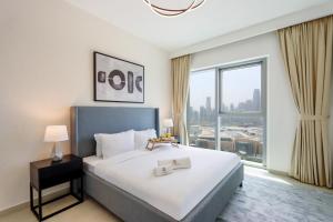 Fotografie z fotogalerie ubytování Livbnb Suites - Elegant 3BR+Maids Room w/ Burj Khalifa View v Dubaji