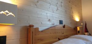 Postel nebo postele na pokoji v ubytování Hotel Lares