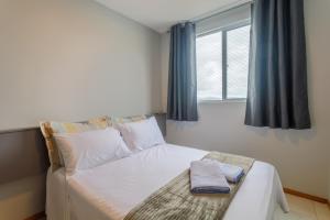 Giường trong phòng chung tại Curta Praia do Quilombo - Lunata +226 ảnh