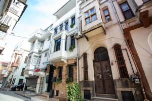 a building on a street in a city at Sayina Hotel in Istanbul