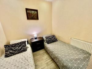 Postel nebo postele na pokoji v ubytování Apartament Karkonoska 19 Karpacz by Przycup w Karkonoszach Apartamenty Karpacz Centrum Karkonosze