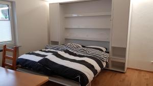 Кровать или кровати в номере Ferienwohnung Zahn