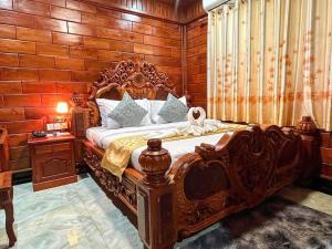 Ένα ή περισσότερα κρεβάτια σε δωμάτιο στο HONG PEP HOTEL