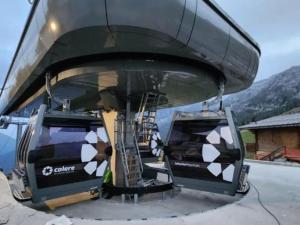 a helicopter with its doors open on a mountain at Casa Cardillo in Colere