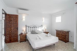 Posteľ alebo postele v izbe v ubytovaní Via Romana 87 Villas Casasol