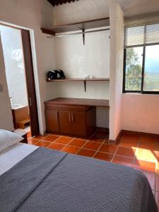 Postel nebo postele na pokoji v ubytování Casa Del Viento, Alojamiento