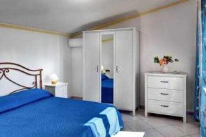 Posteľ alebo postele v izbe v ubytovaní GOCCE VILLAS - Il Frantoio + 17 fotografií