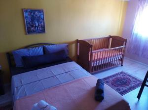 Postel nebo postele na pokoji v ubytování House GabriDora