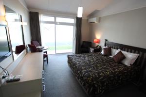 Postel nebo postele na pokoji v ubytování Hotel Ashburton