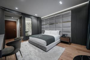Katil atau katil-katil dalam bilik di Marinaj Hotel
