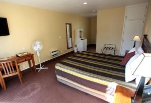 Postel nebo postele na pokoji v ubytování Hotel Ashburton