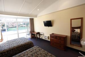 Postel nebo postele na pokoji v ubytování Hotel Ashburton
