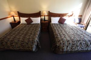 Postel nebo postele na pokoji v ubytování Hotel Ashburton