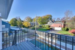 a balcony with a view of a street at Pet-Friendly Marblehead Home Near Preston Beach! in Marblehead
