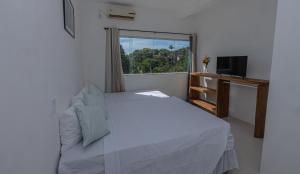 Postel nebo postele na pokoji v ubytování Pousada Recanto dos Pássaros - Arraial d'Ajuda