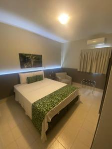 Giường trong phòng chung tại EKO HOTEL