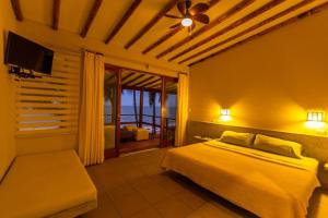 מיטה או מיטות בחדר ב-Casa Luz De Luna-MANCORA