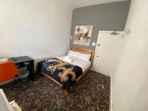 Postel nebo postele na pokoji v ubytování Aaran Central Guesthouse