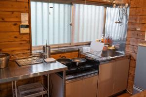 Kitchen o kitchenette sa Sunland O66 - Vacation STAY 72793v