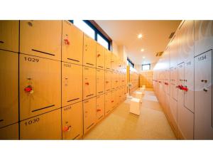 a locker room with lockers in a building at Kutsurogi no Yado Juraku - Vacation STAY 03508v in Tobe