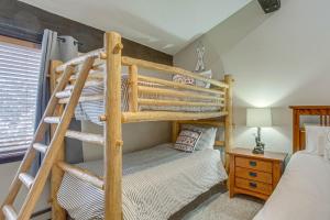 a bedroom with a bunk bed and a ladder at Colorado Escape w/ Pool Access & Mountain Views! in Avon +24 photos
