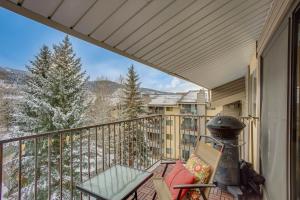 a balcony with a view of a snow covered mountain at Colorado Escape w/ Pool Access & Mountain Views! in Avon