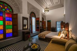 Postel nebo postele na pokoji v ubytování Riad La Perle De La Médina