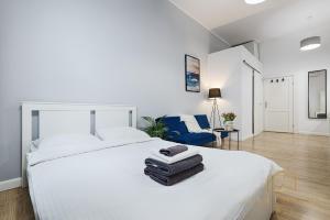 Llit o llits en una habitació de Royal Style Apartment