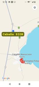 eine Karte eines Autohändlers mit einem Stoppschild in der Unterkunft Cabaña Sion in Puerto Madryn