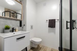 Kúpeľňa v ubytovaní ApartHouse Center + 25 fotografií
