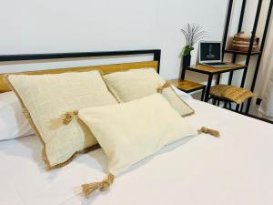 Voodi või voodid majutusasutuse Calipso Ocean Lodge- Avellana Beach Hotel toas