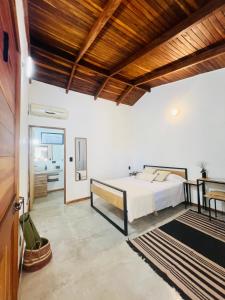 Voodi või voodid majutusasutuse Calipso Ocean Lodge- Avellana Beach Hotel toas