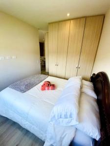 Ein Bett oder Betten in einem Zimmer der Unterkunft Moderno Alojamiento Calle 100