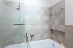A bathroom at Keys of Italy / Valpetrosa 10 - Touch of Elegance